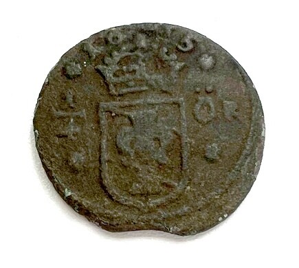 Шведская монета с берега Калищенского озера